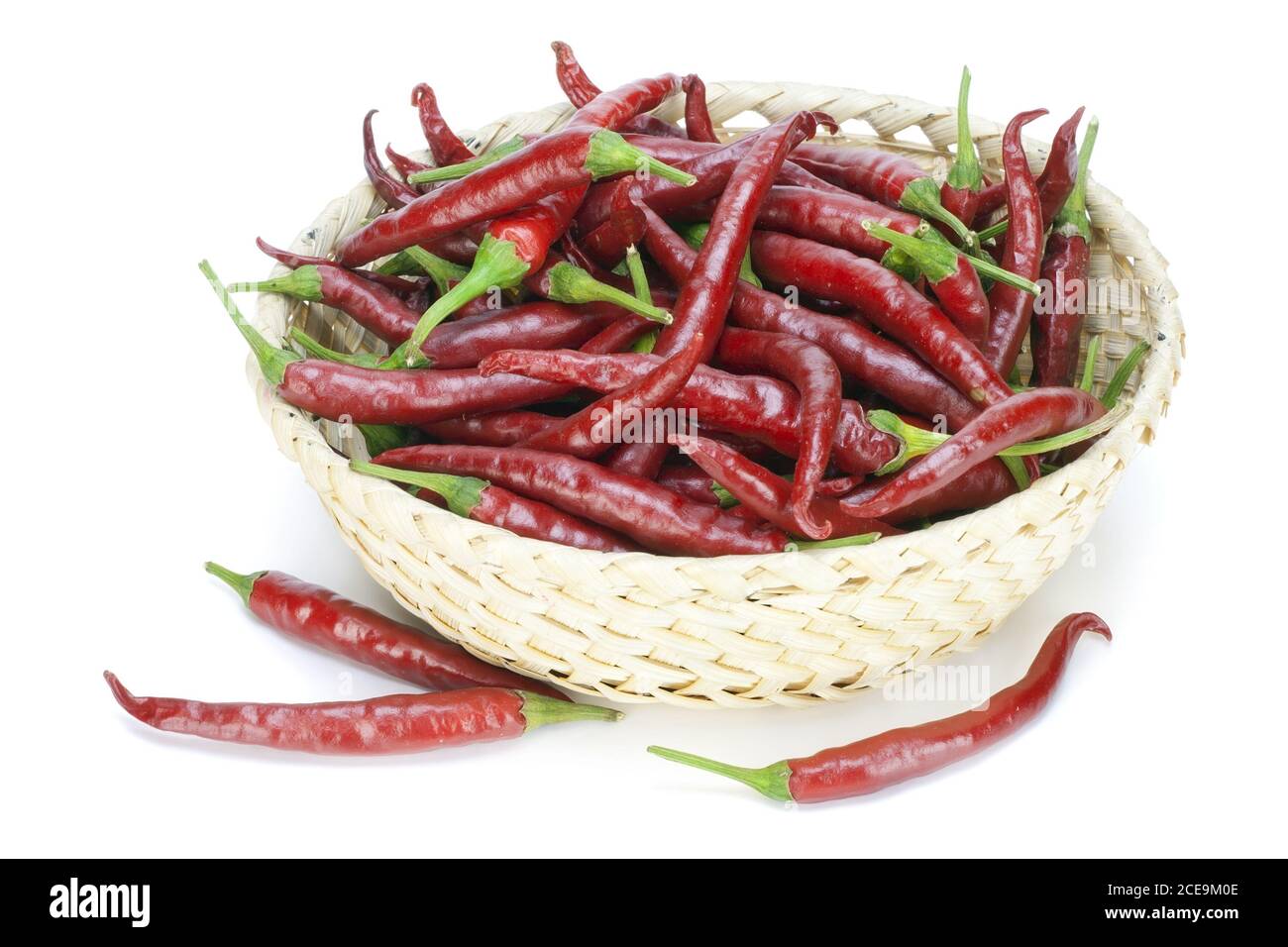 Red hot chilli peppers in basket Stock Photo