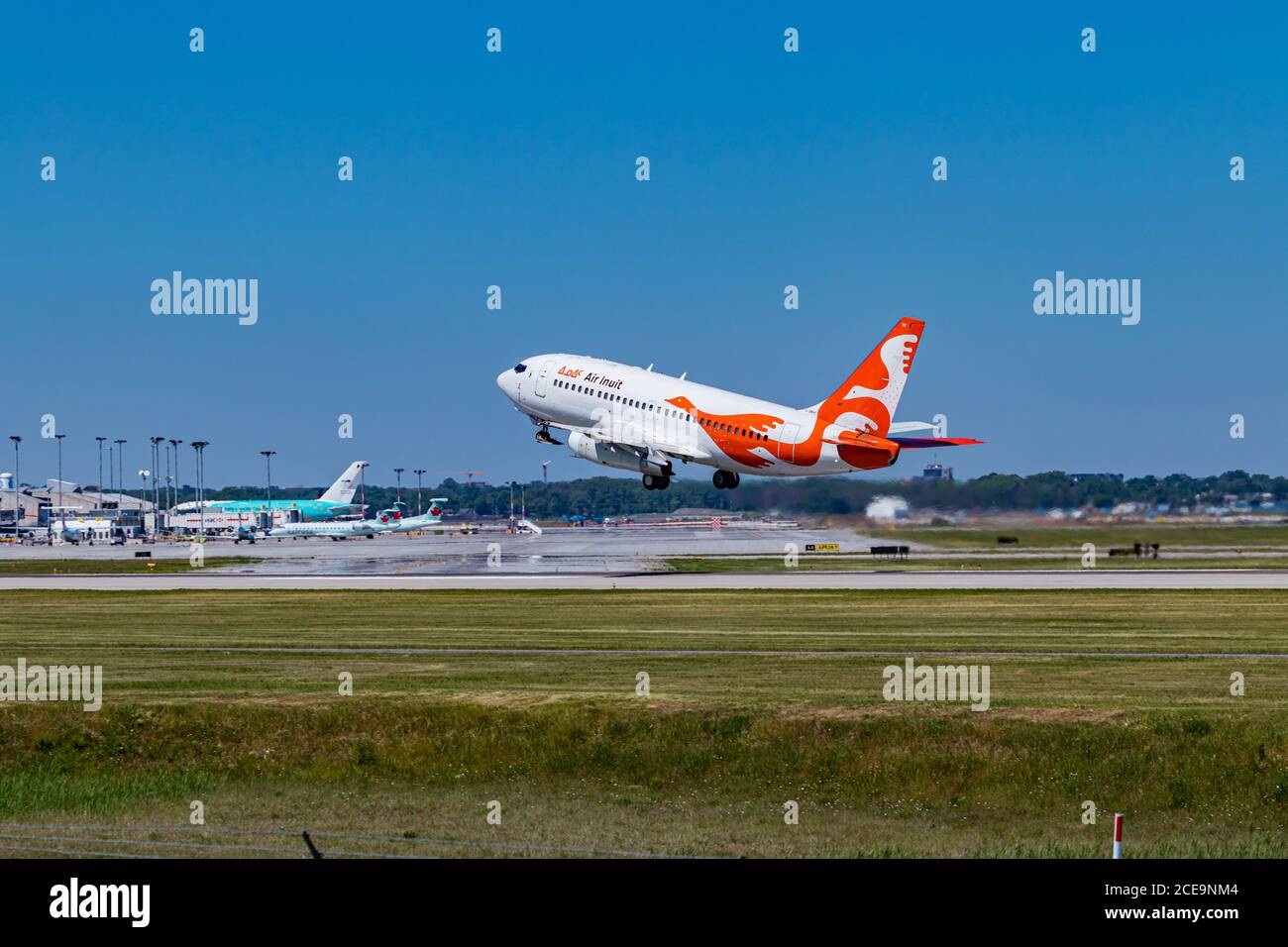 Montreal, Quebec / Canada - 06/20-2020 : An Air Inuit 737-200 aircraft taking off from Montreals Trudeau Airport (CYUL). Stock Photo