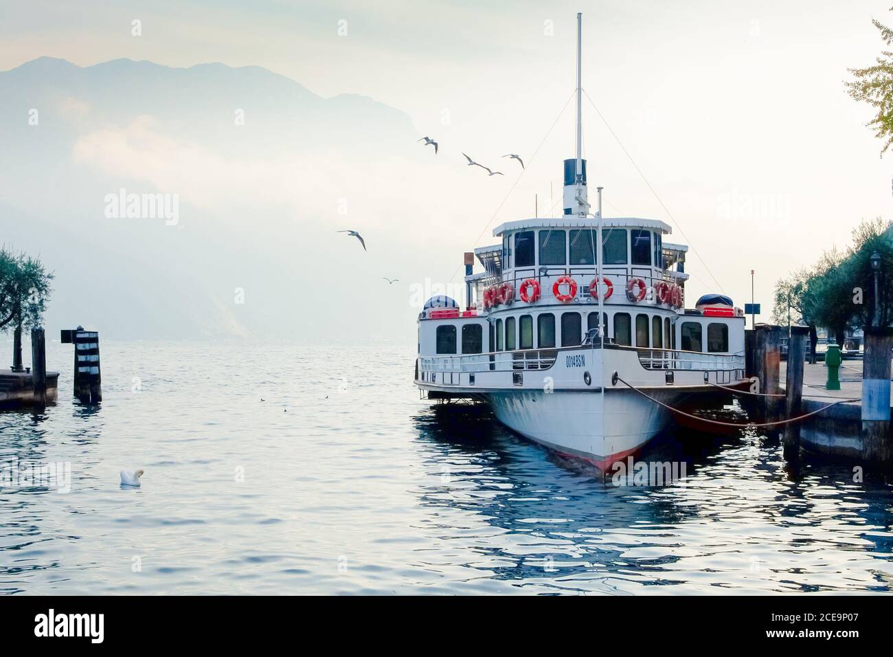 Lake Garda ferry moored at the port of Riva of Garda Stock Photo