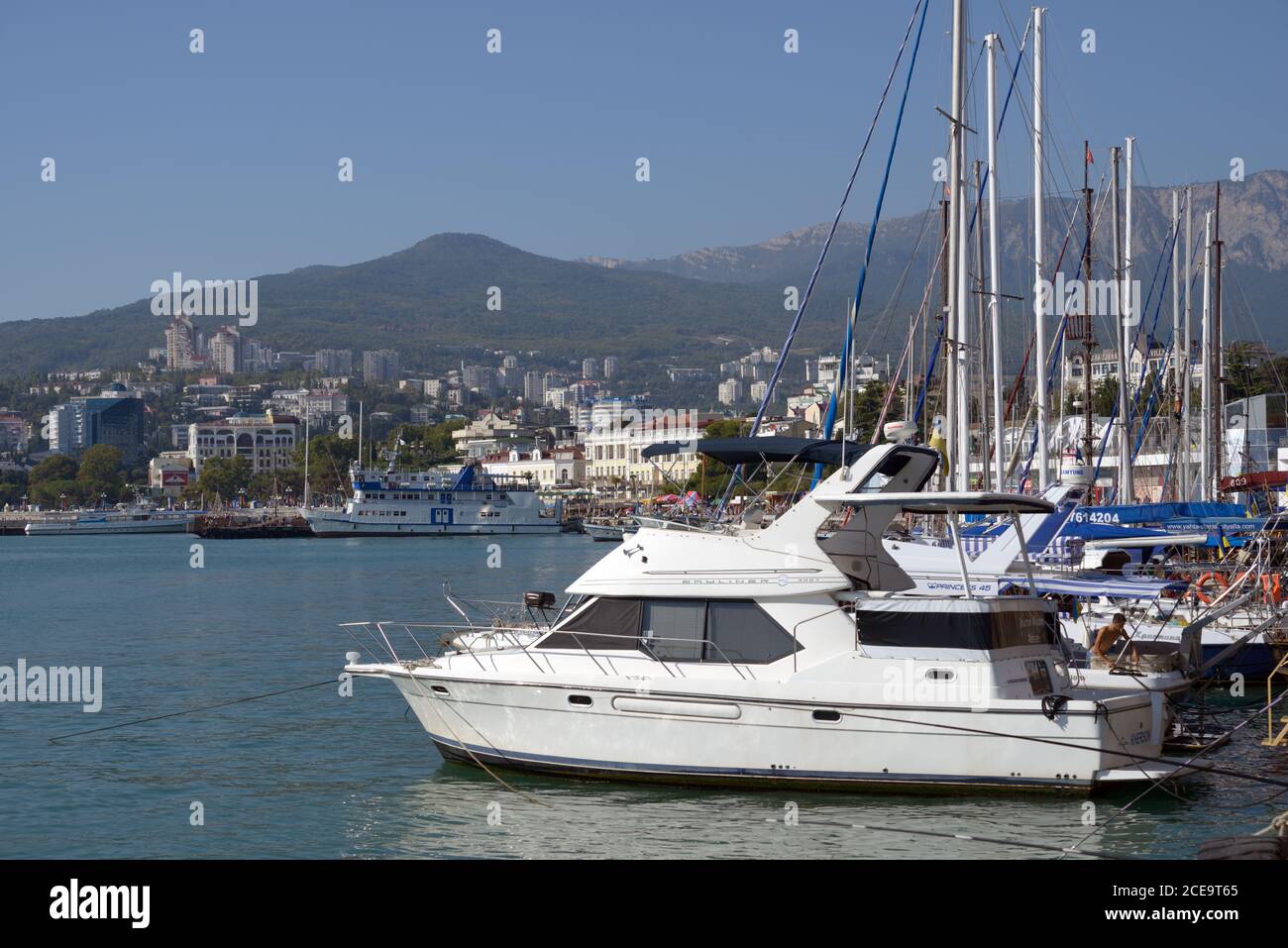 Yachts and boats moored at the sea embankment of Yalta, Crimea, Ukraine Stock Photo