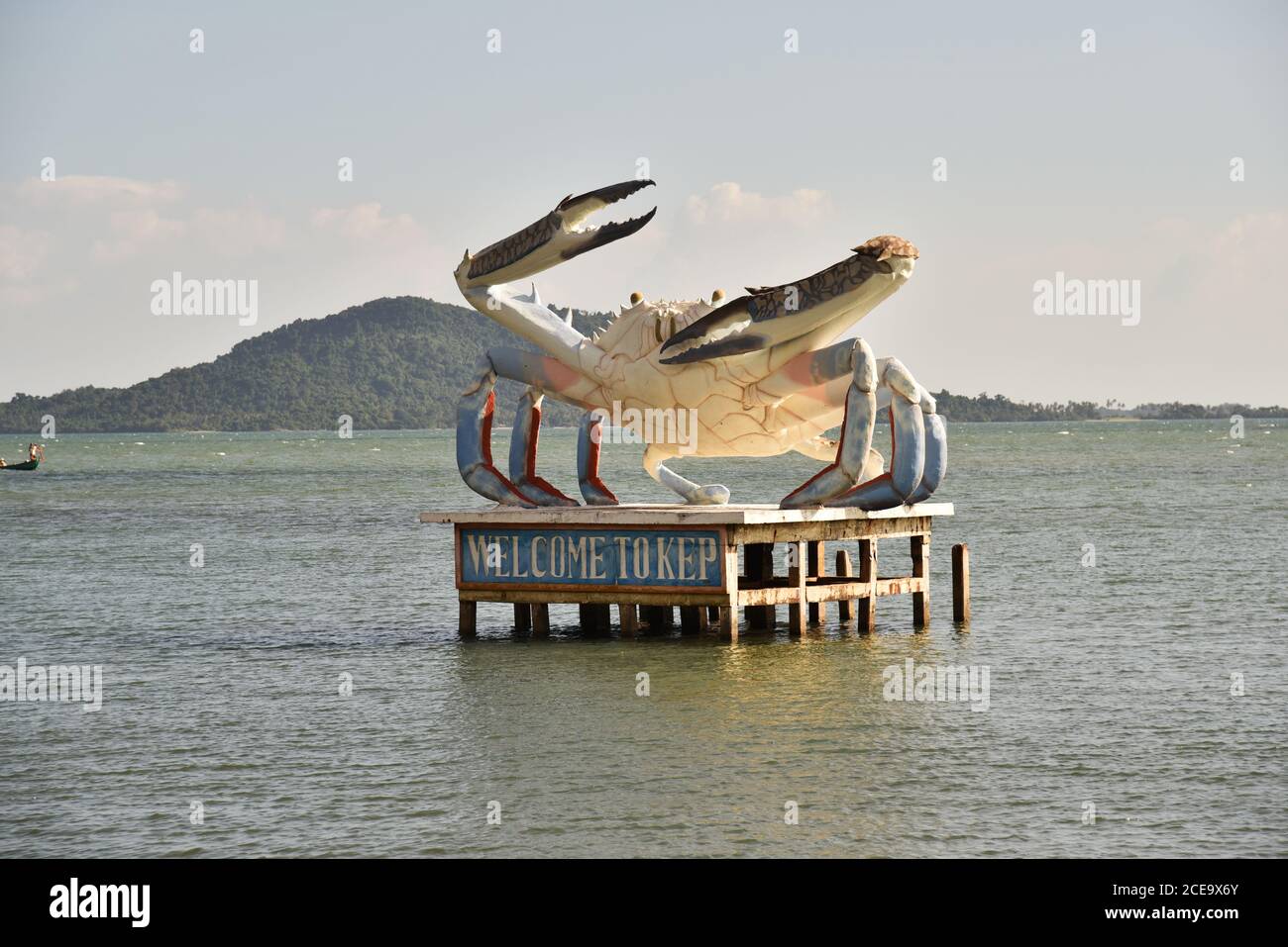 Welcome to Kep sign with a huge crab statue in the ocean, Kep province, Cambodia Stock Photo
