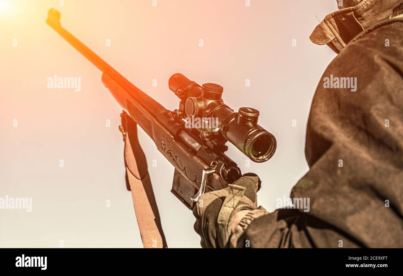 The man is on the hunt. Hunt hunting rifle. Hunter man. Hunting period ...