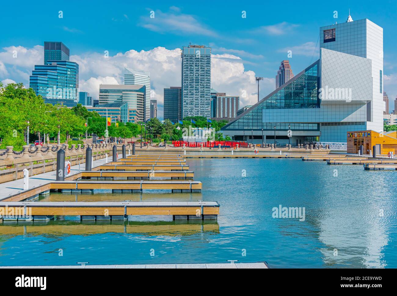 Downtown Cleveland Ohio with it's contemporary skyline  reflects in Lake Erie. Open boat slips await incoming vessels. Stock Photo