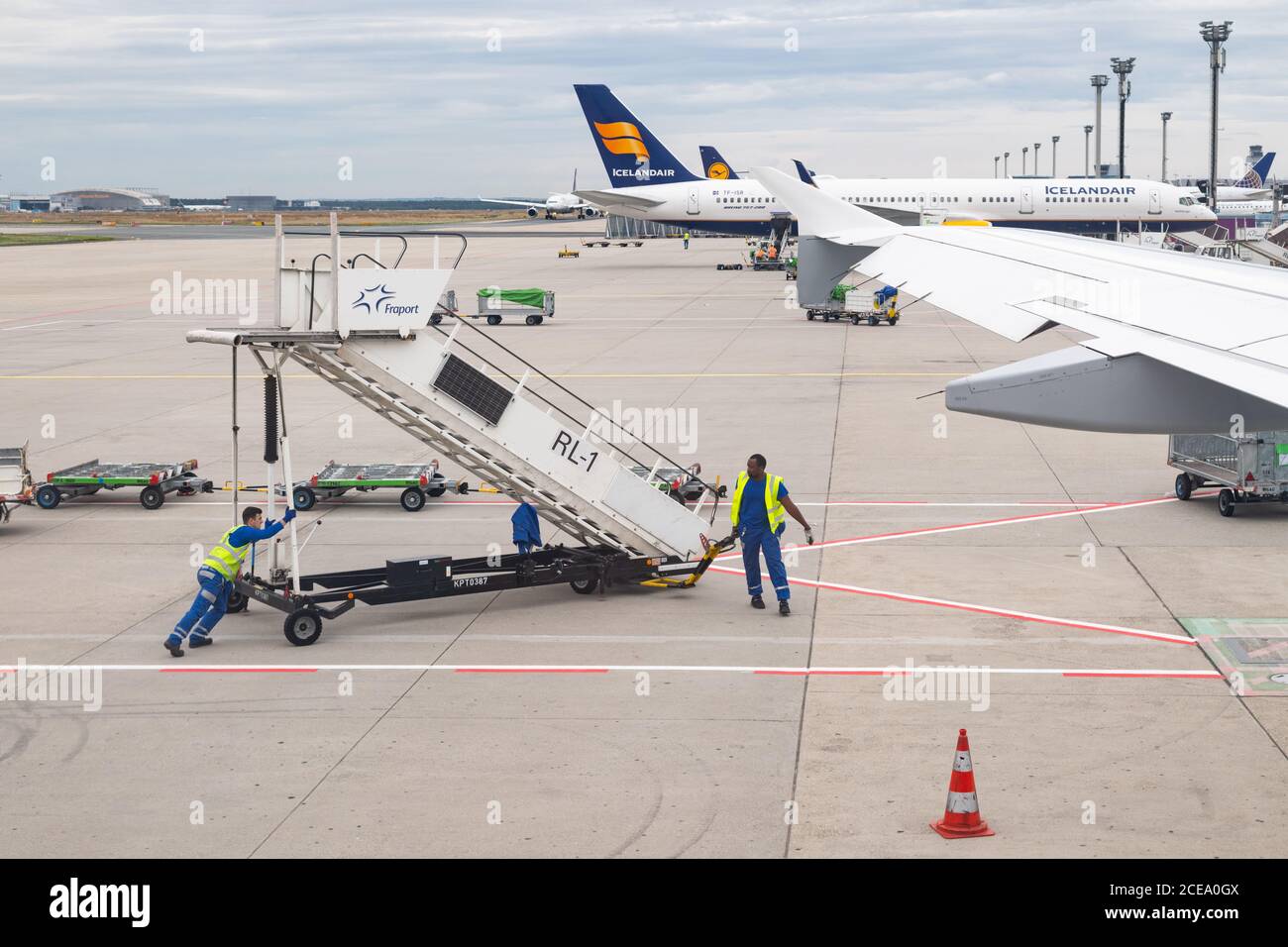 Fraport employees working at Frankfurt Airport, Germany Stock Photo