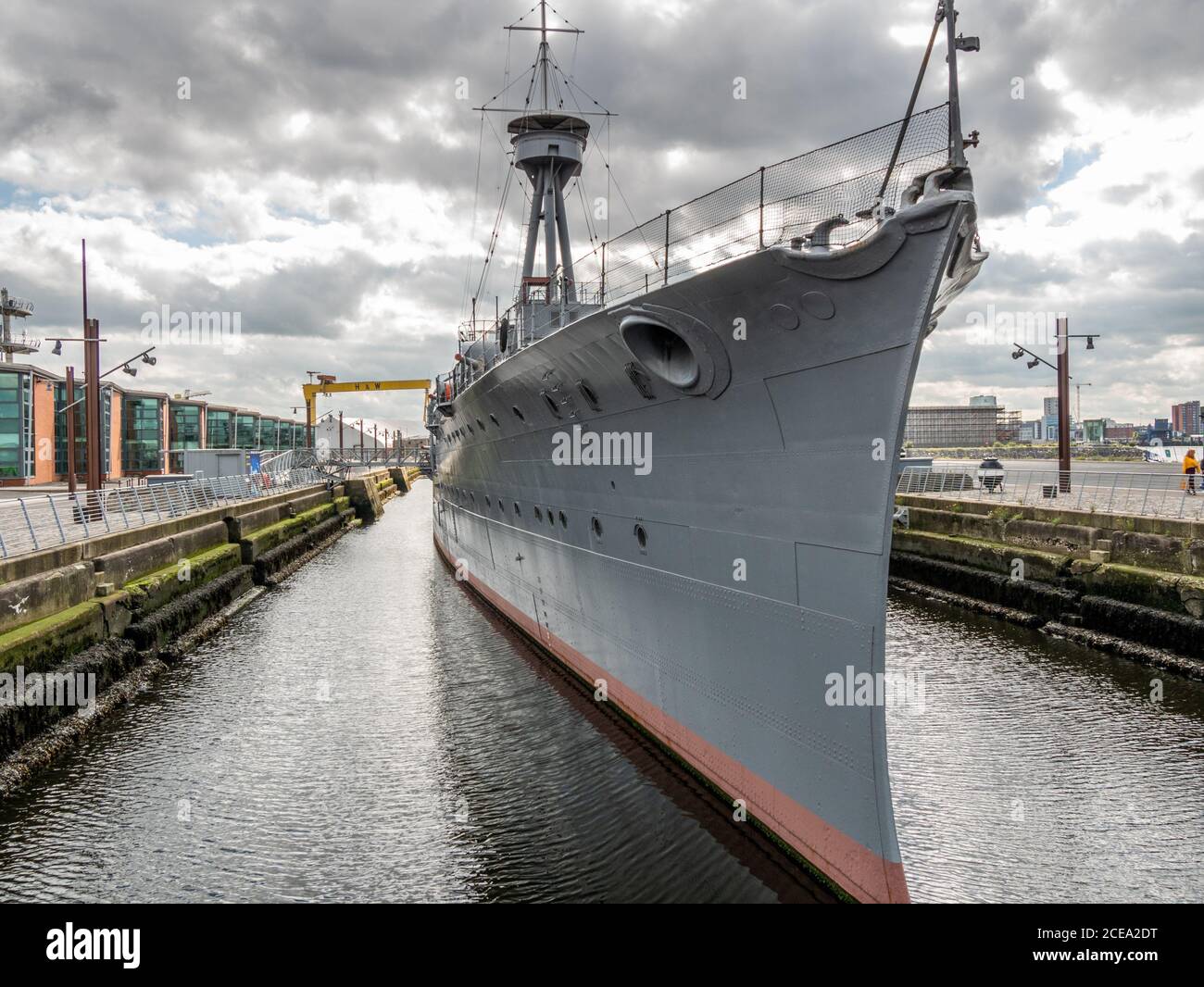 Belfast, Northern Ireland, UK, 31 August 2020: HMS Caroline a restored First World War cruiser on display in Alexandra Dock may be taken to Portsmouth for her own protection. The future of the attraction is in doubt as she is closed to the public because of the Coronavirus pandemic and necessary maintenance is being delayed. It is believed that should the ship remain closed the National Museum of the Royal Navy may decide she should be taken to Portsmouth. HMS Caroline was commissioned in 1914 and saw action in the First World War. She was decommissioned in 2011. Stock Photo