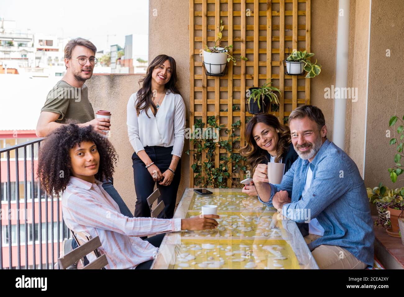 Colleagues chatting and laughing Stock Photo