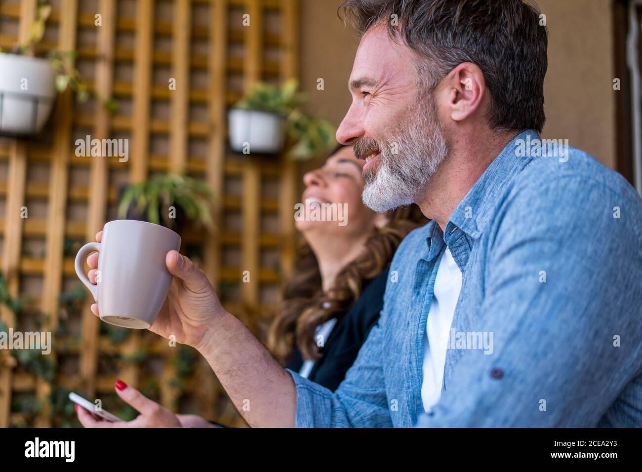 Colleagues chatting and laughing Stock Photo