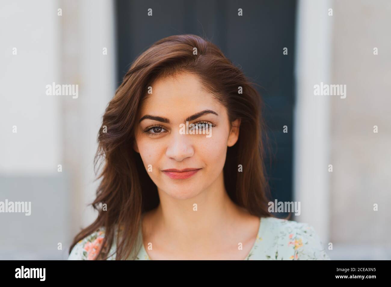 Pretty young Woman looking at camera Stock Photo