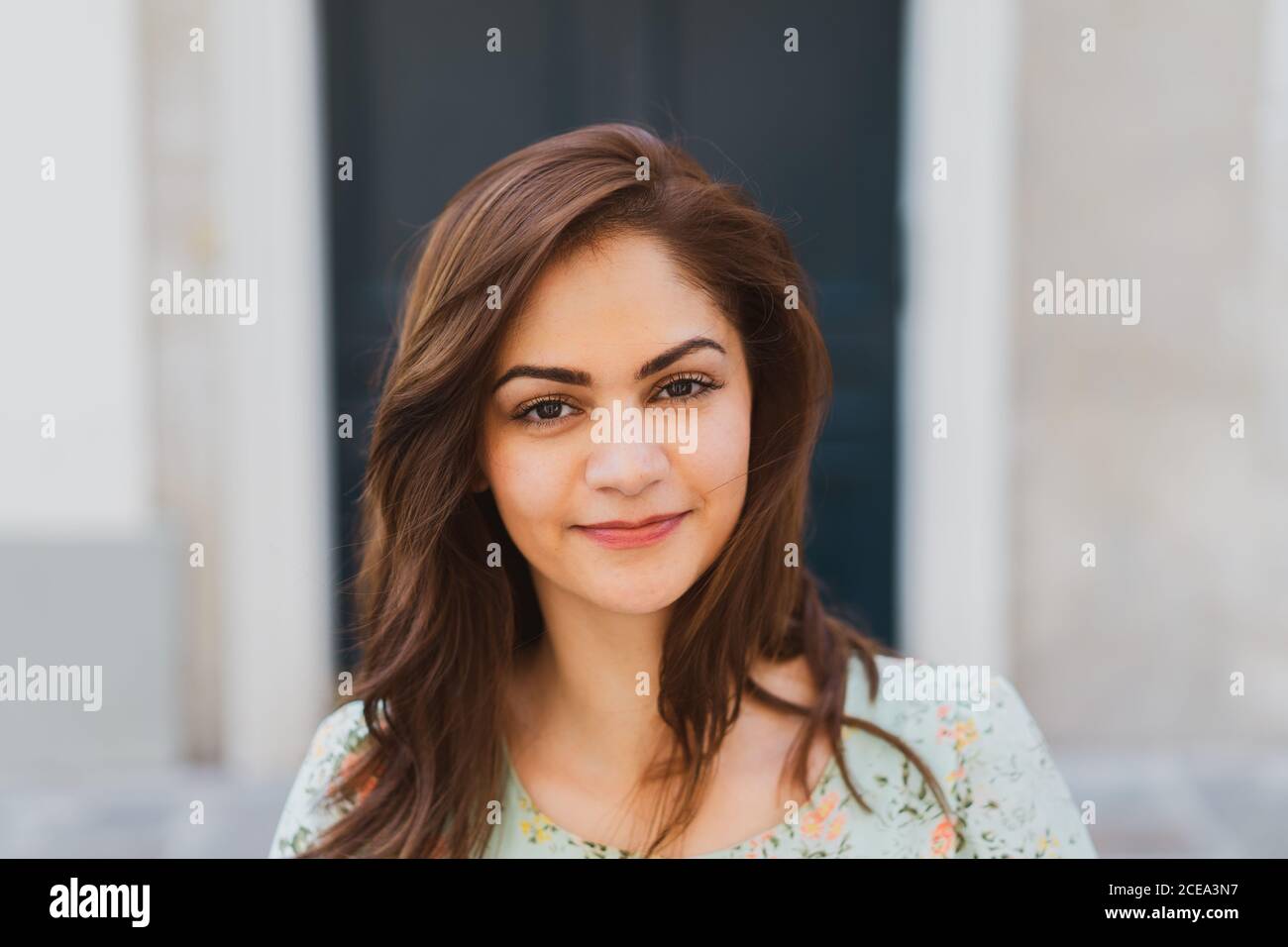 Pretty young Woman looking at camera Stock Photo