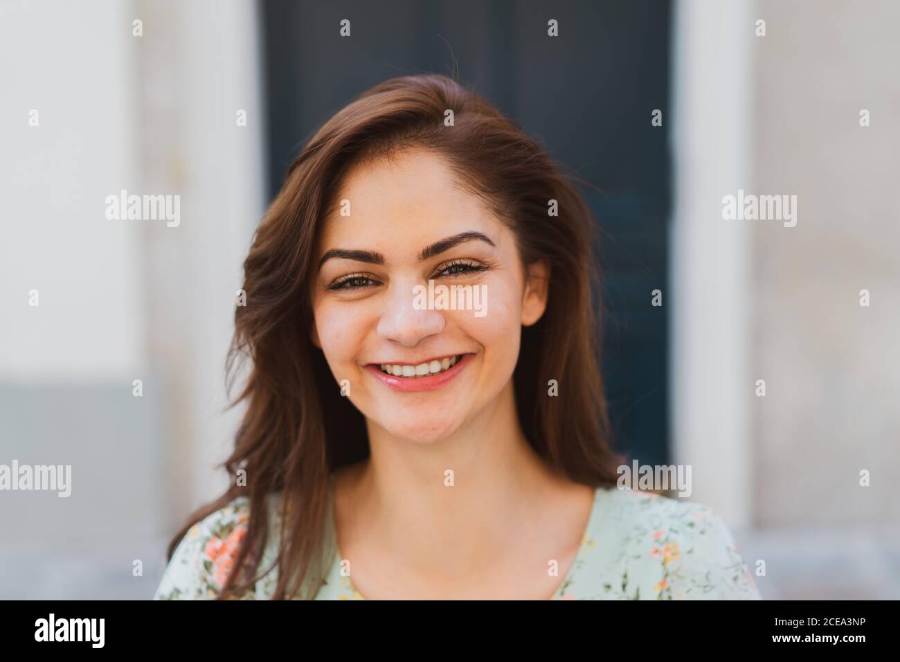 Pretty young Woman looking at camera Stock Photo