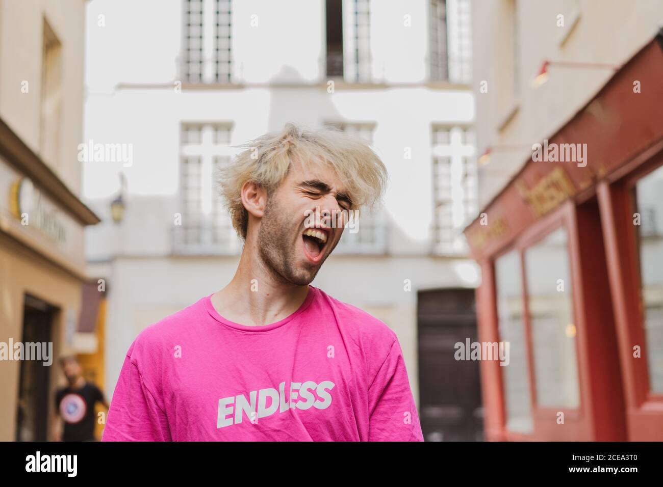 Stylish man posing on street Stock Photo