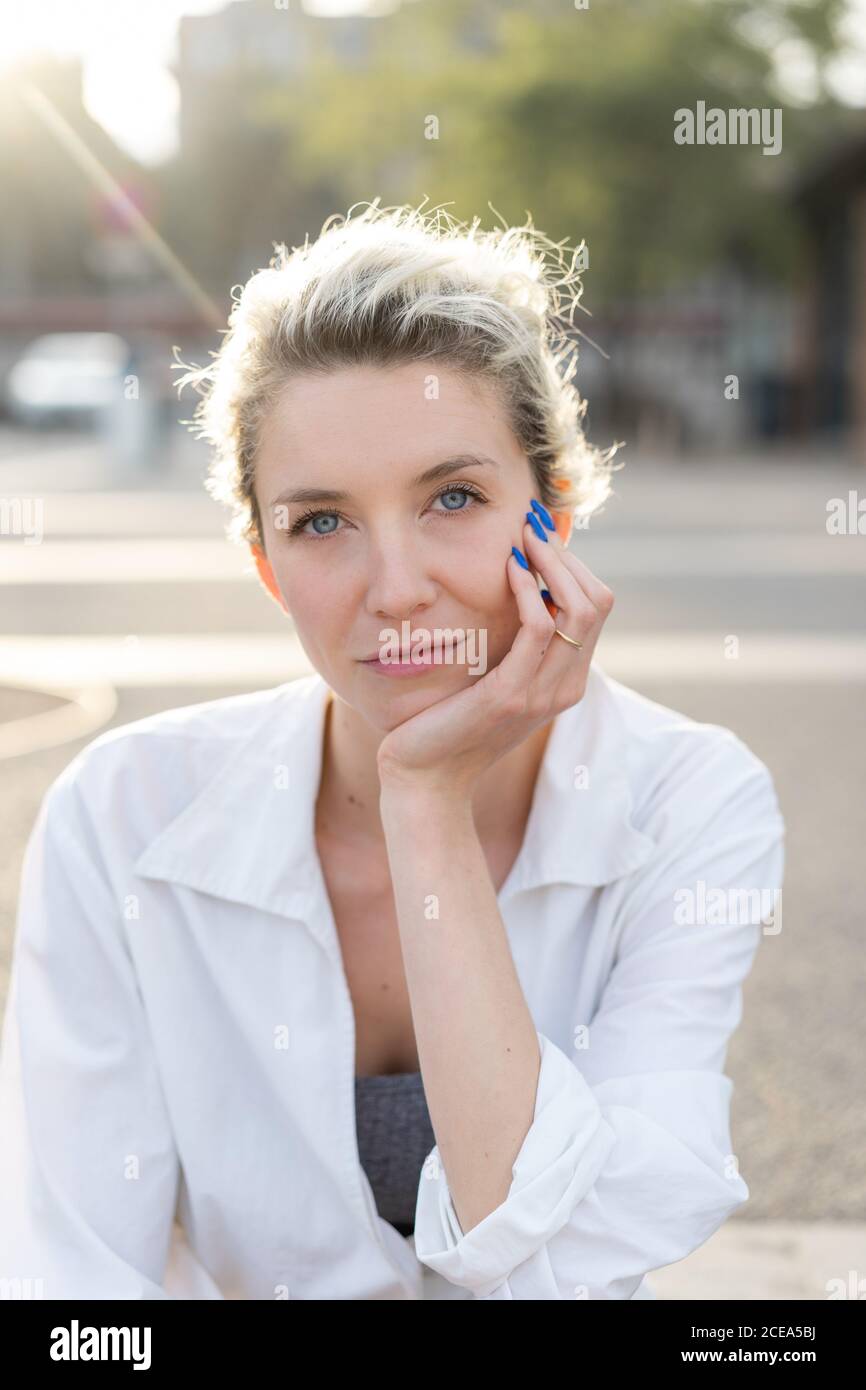 blonde Woman portrait looking at the camera Stock Photo - Alamy