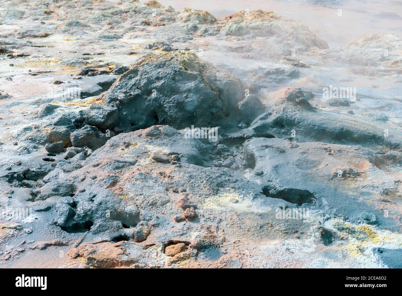 Steaming sulfur pools in unearthly Icelandic landscape Stock Photo