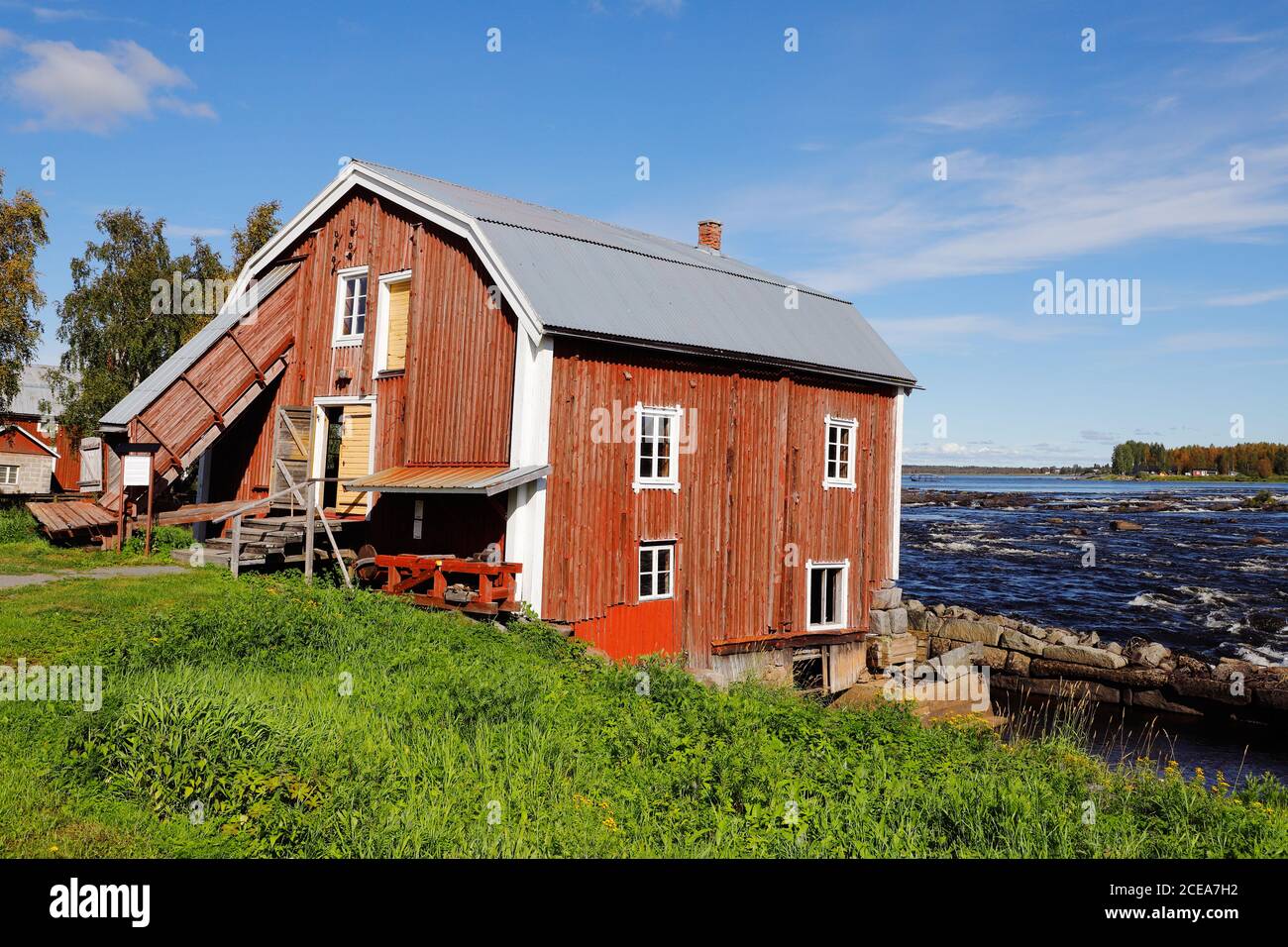 Old watermill building at the Kukkola rapids. Stock Photo