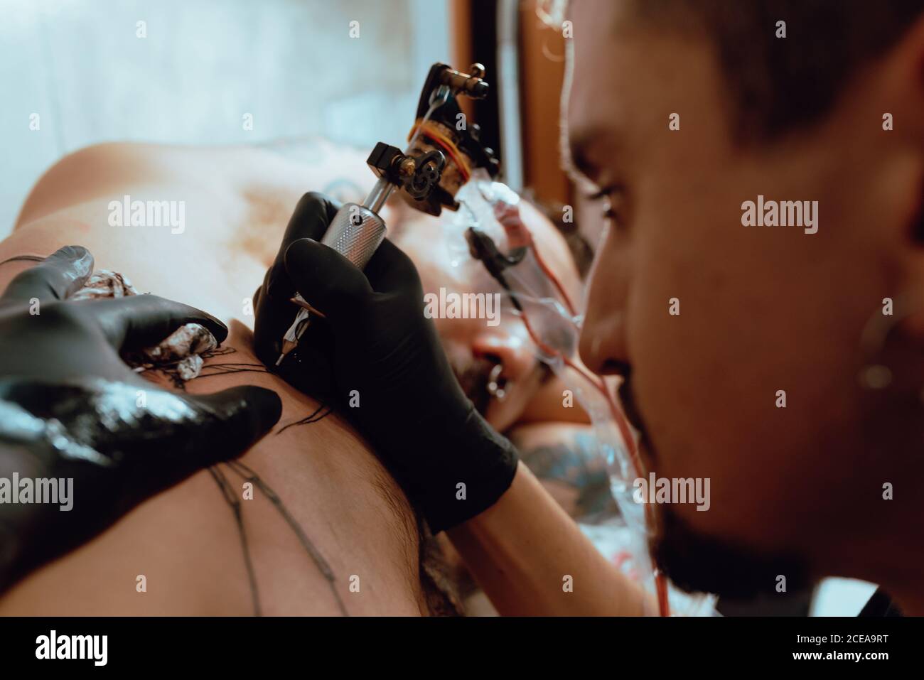 Crop man drawing tattoo sketch hi-res stock photography and images - Alamy