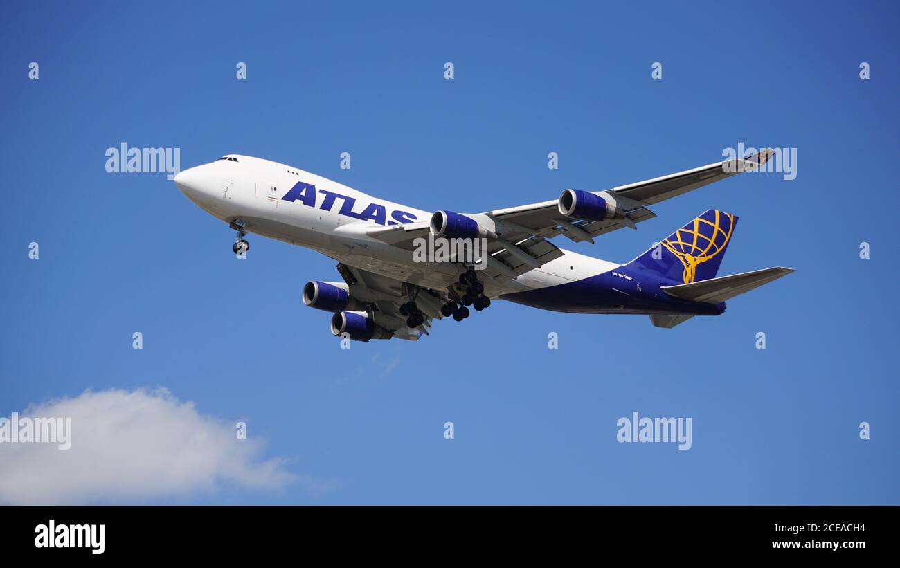 Atlas Air Boeing 747 cargo plane prepares to land at Chicago O'Hare International Airport. The plane's registration number is N477MC. Stock Photo