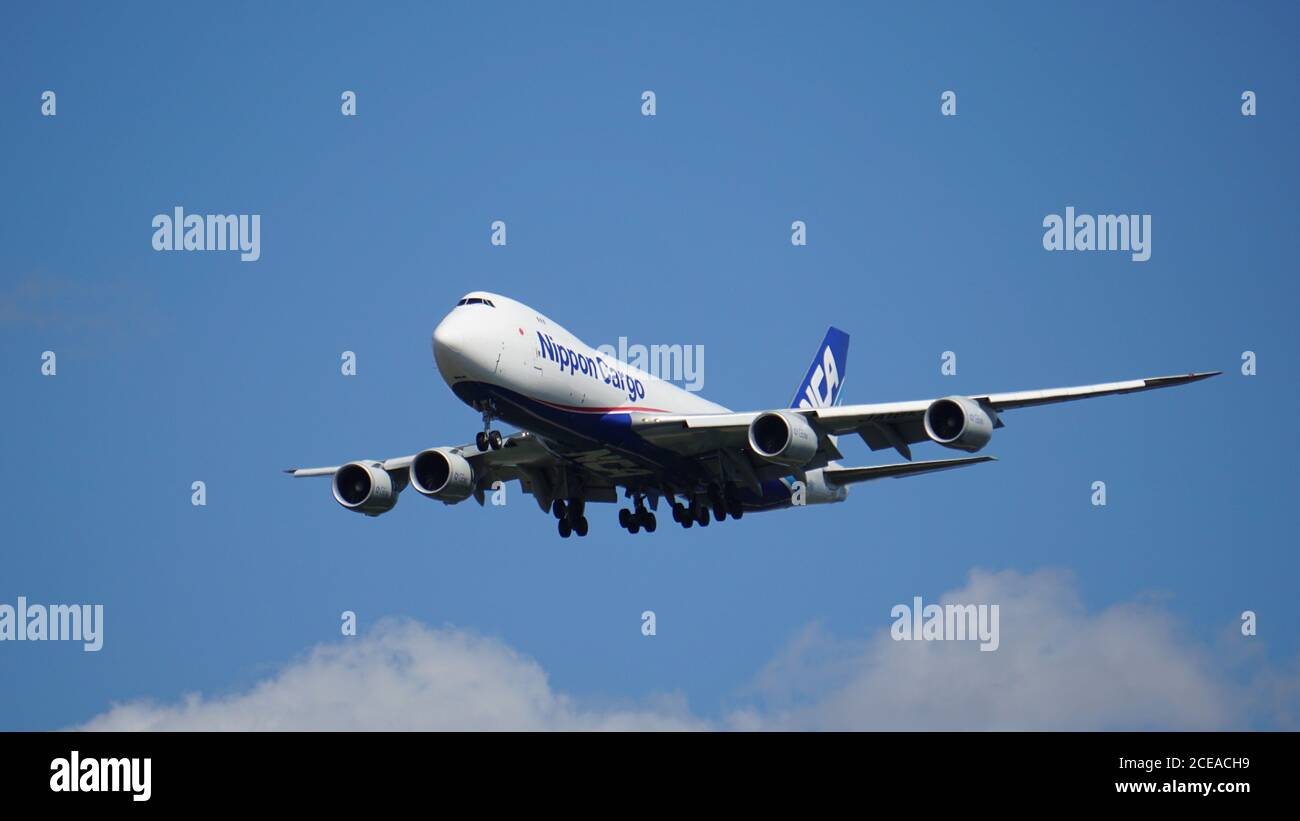 Nippon Cargo Boeing 747-8F prepares for landing at Chicago O'Hare International Airport. The plane's registration is JAI8KZ. Stock Photo