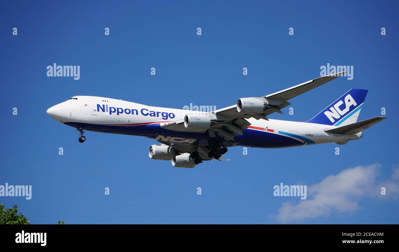 Nippon Cargo Boeing 747-8F prepares for landing at Chicago O'Hare International Airport. The plane's registration is JAI8KZ. Stock Photo