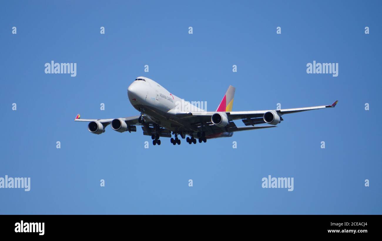 Asiana Cargo Boeing 747 prepares for landing at Chicago O'Hare International Airport. The plane's registration is HL7419. Stock Photo