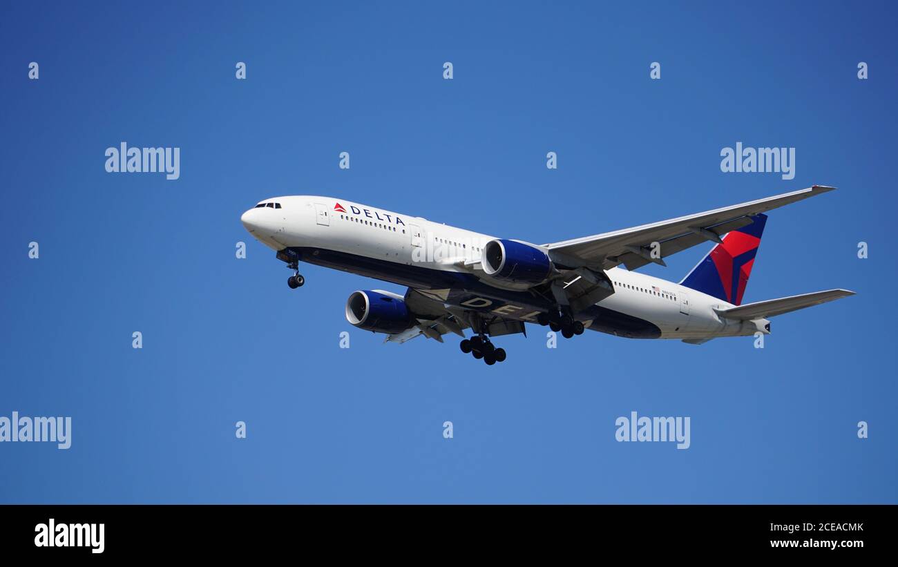 Delta Airlines Boeing 777 Prepares to Land at Chicago O'Hare International Airport. The plane's registration is N860DA. Stock Photo