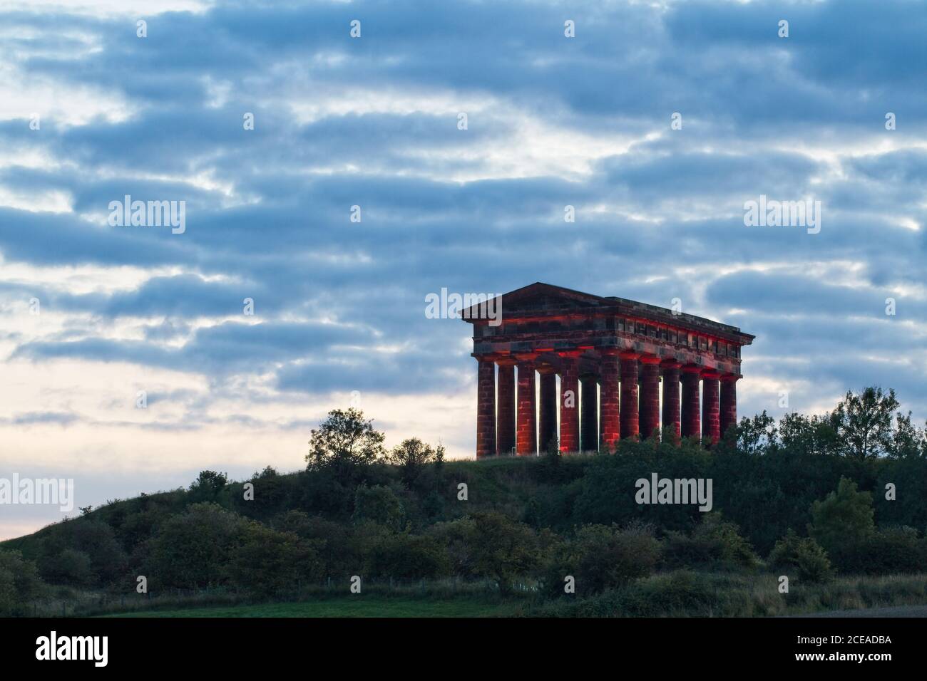 The landmark Earl of Durham Monument stands on a hilltop near Penshaw in County Durham. Image captured at dusk. Stock Photo