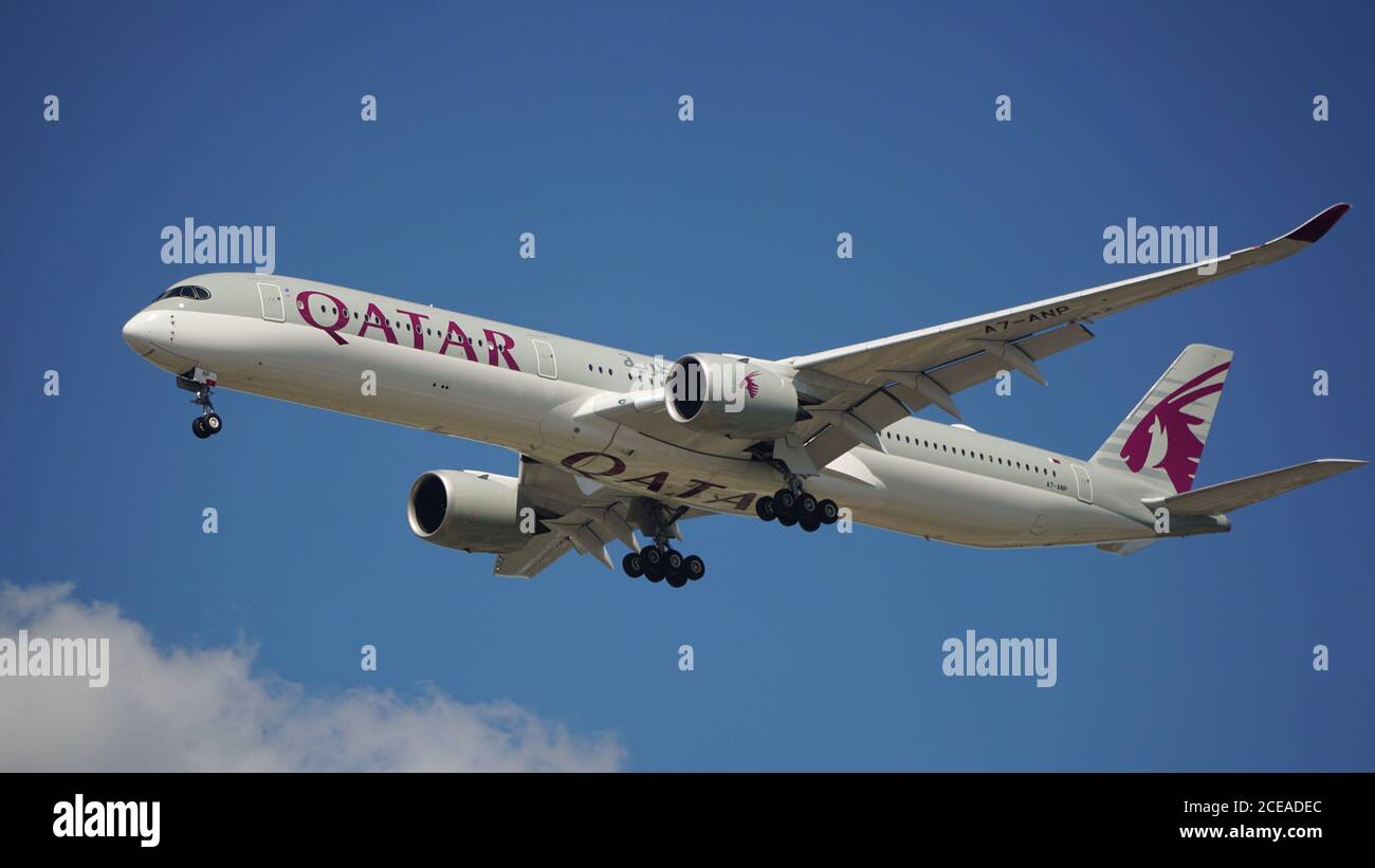 Qatar Airways Airbus A350 prepares for landing at Chicago O'Hare International Airport. The plane's registration is A7ANP. Stock Photo