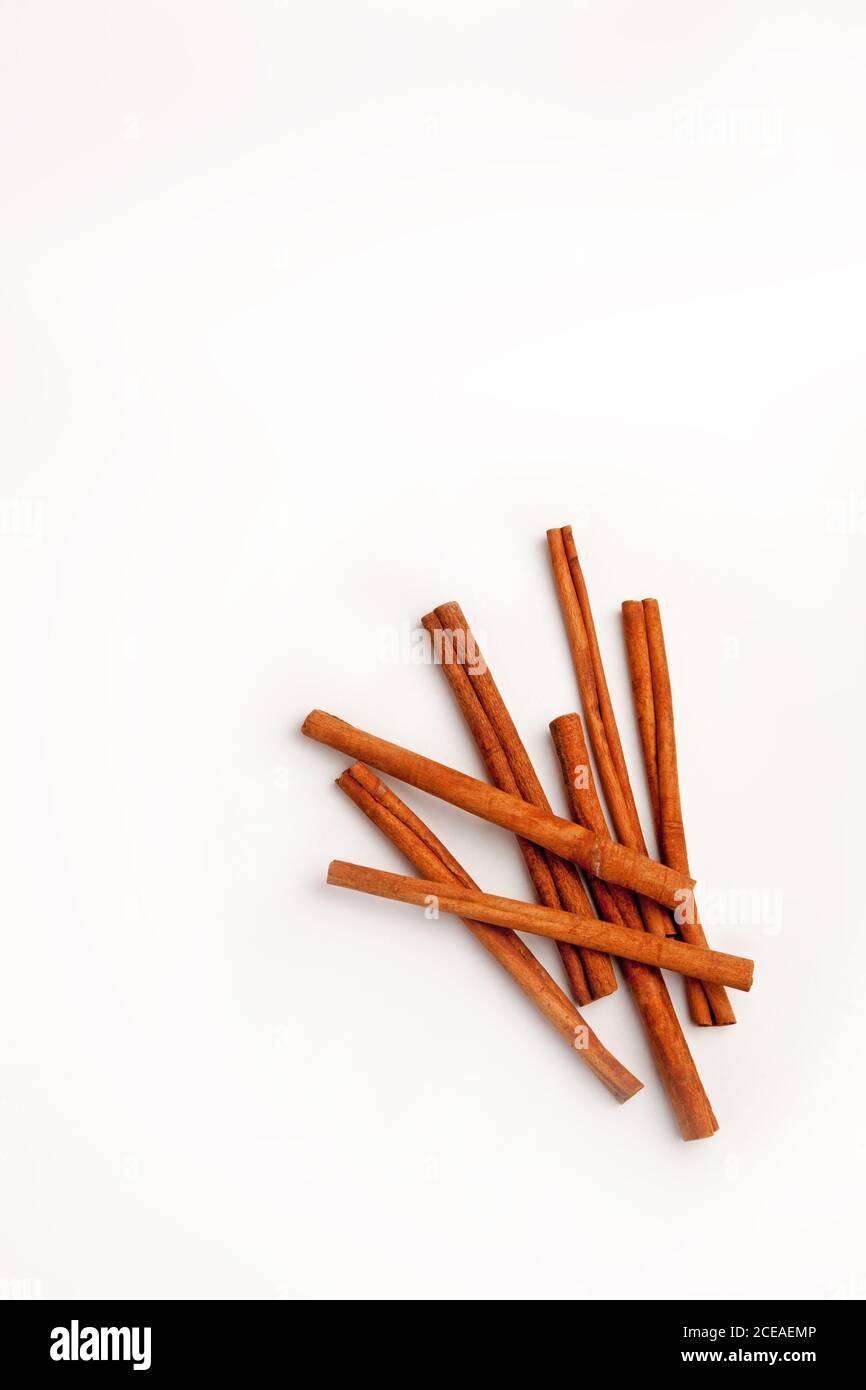 Cinnamon sticks arranged on a white background Stock Photo