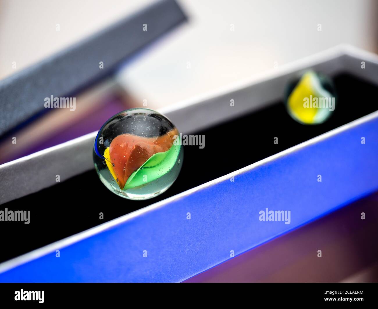 Purey Glass marbles. Child's play Stock Photo - Alamy