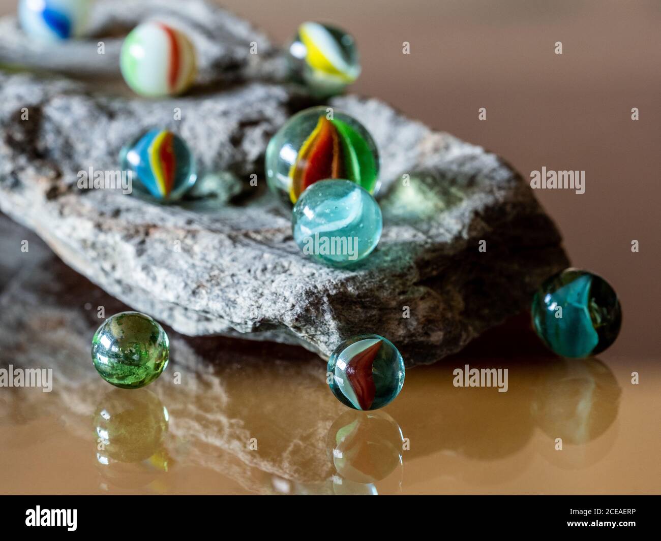 Purey Glass marbles. Child's play Stock Photo - Alamy