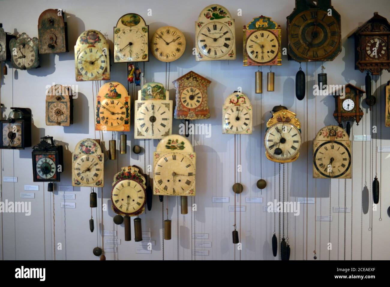Clocks on display at the Black Forest Museum, Triberg, Germany. Stock Photo