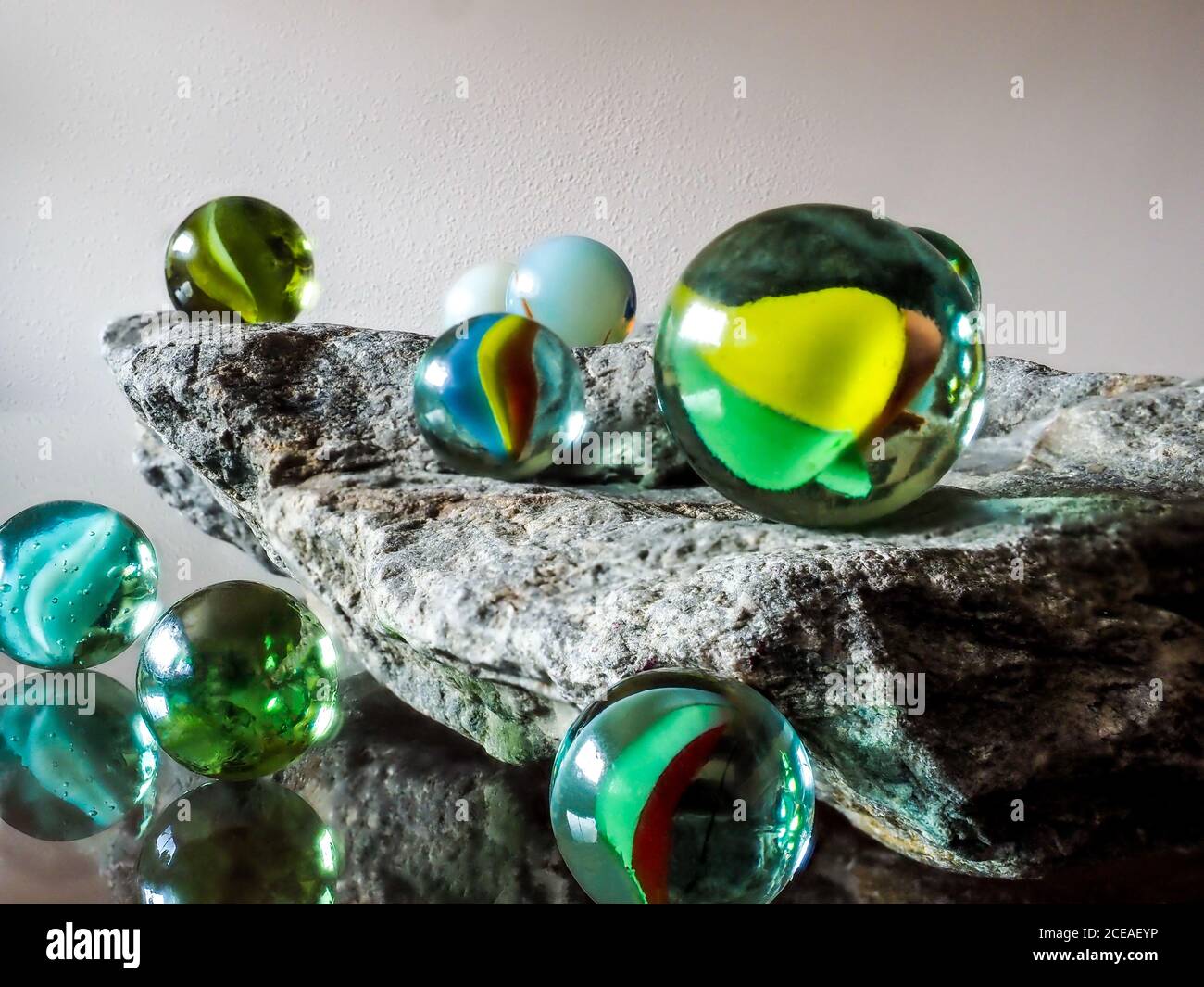 Purey Glass marbles. Child's play Stock Photo - Alamy