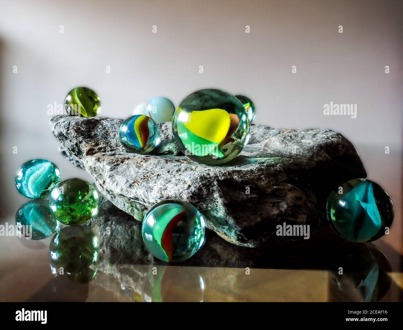 Purey Glass marbles. Child's play Stock Photo - Alamy