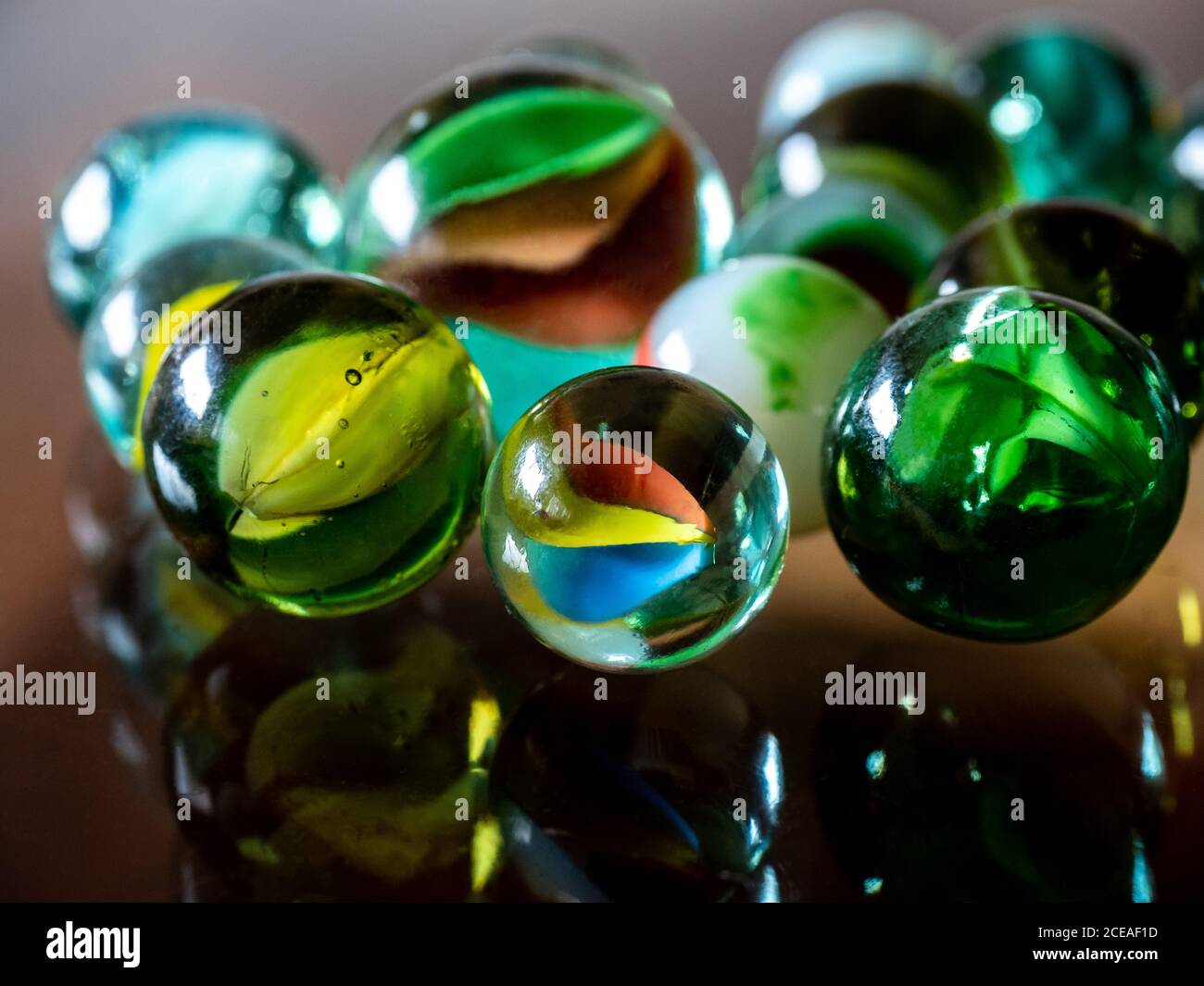 Purey Glass marbles. Child's play Stock Photo - Alamy
