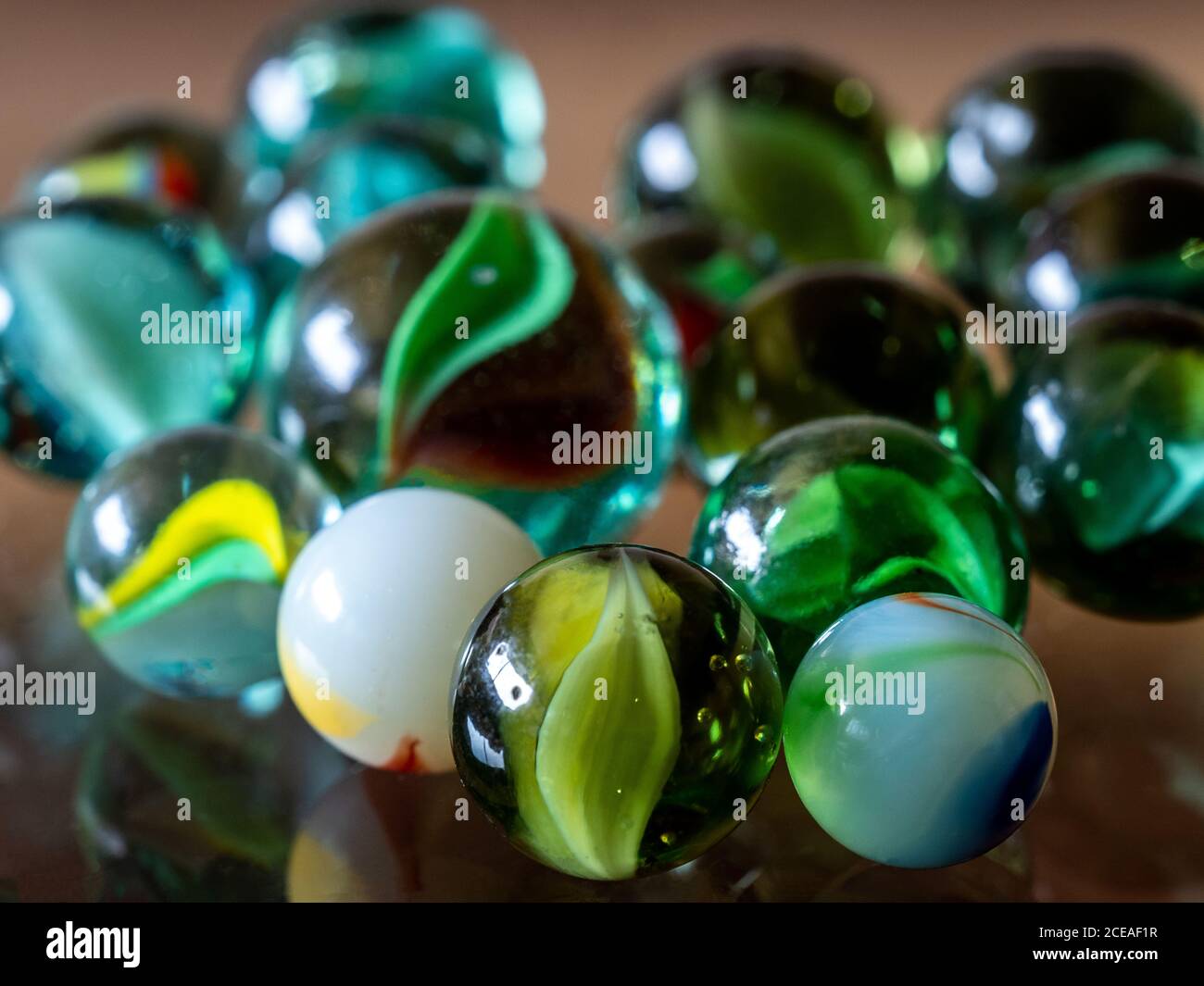 Purey Glass marbles. Child's play Stock Photo - Alamy
