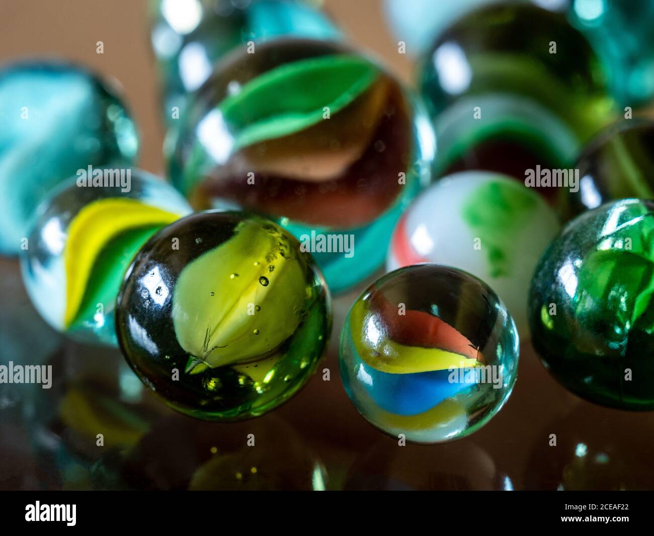 Purey Glass marbles. Child's play Stock Photo - Alamy