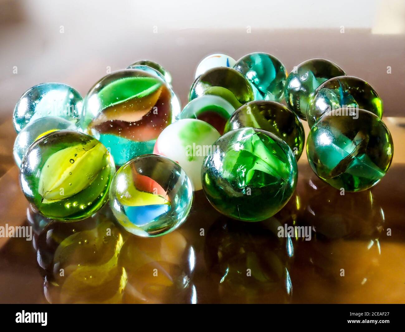 Purey Glass marbles. Child's play Stock Photo - Alamy