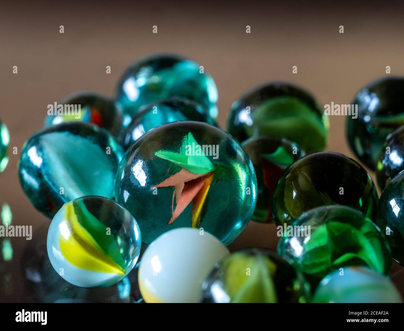Purey Glass marbles. Child's play Stock Photo - Alamy