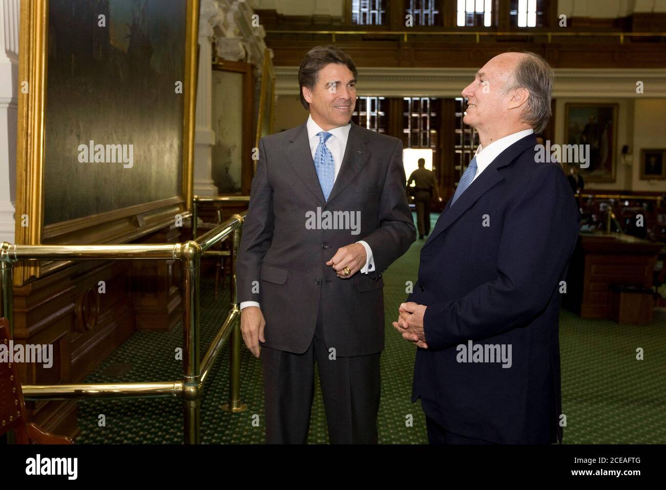 Austin, TX April 12, 2008:  Texas Governor Rick Perry (l) shows The Aga Khan (r), leader of the Naziri Muslims, a painting in the Senate chamber on Saturday prior to a luncheon at the Texas Capitol.  The Aga Khan is celebrating his 50th year as a leader with an eight-day  U.S. tour.  ©Bob Daemmrich/ Stock Photo