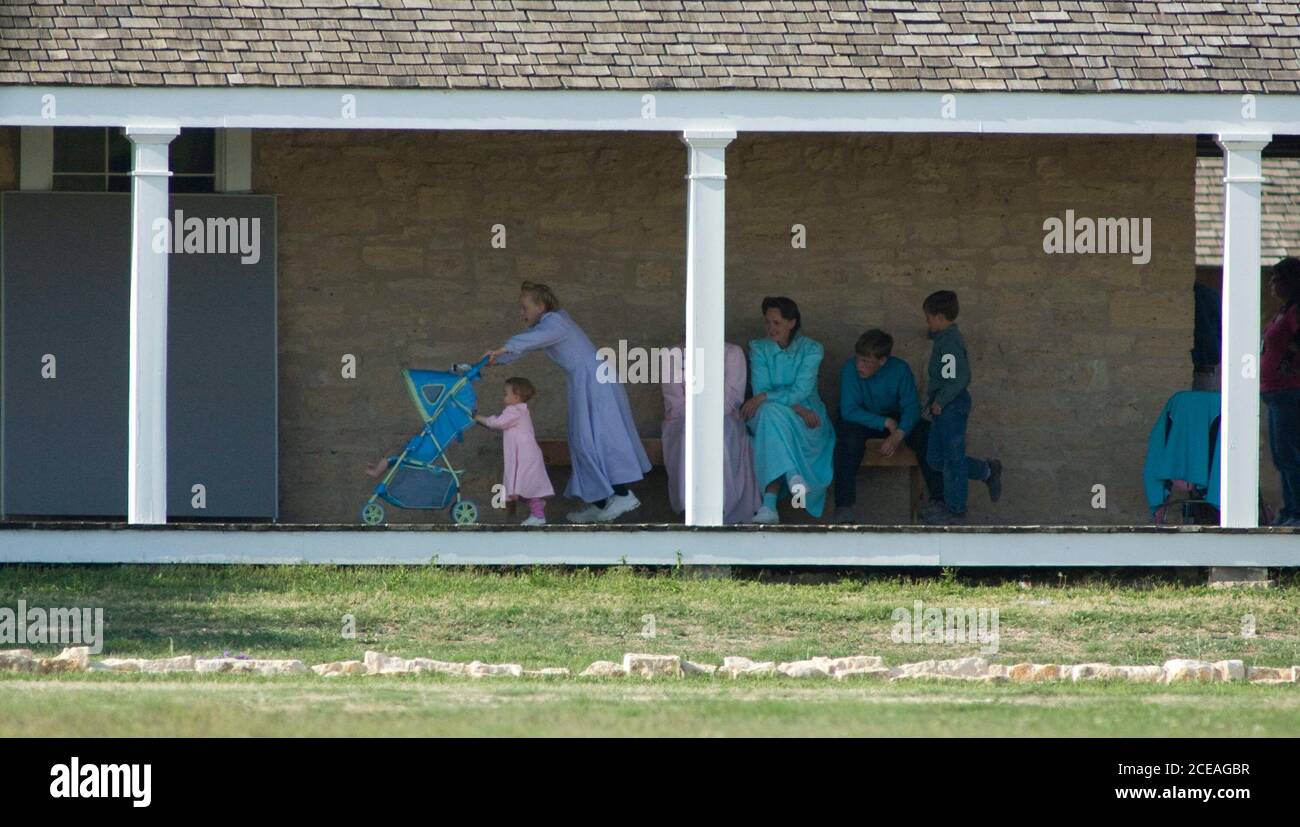 San Angelo, Texas, April 8, 2008: Members of the Yearning for Zion religious community of polygamists based near Eldorado Texas settle in at the Fort Concho historic site. State officials raided the community after allegations of child endangerment and moved hundreds of children to temporary housing while investigations continue into the charges. ©Bob Daemmrich Stock Photo