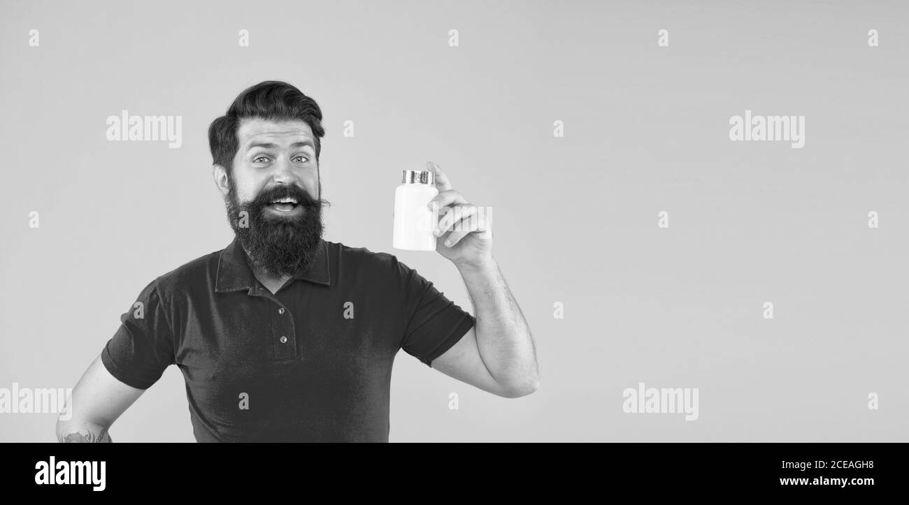 Health is in the balance. Health care. Hipster hold plastic container