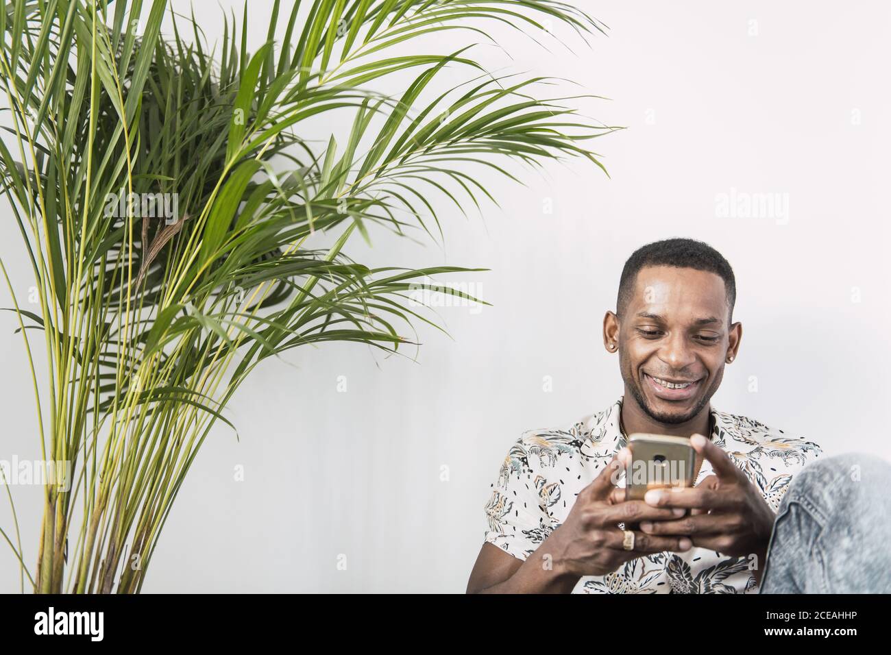 black man with smartphone Stock Photo