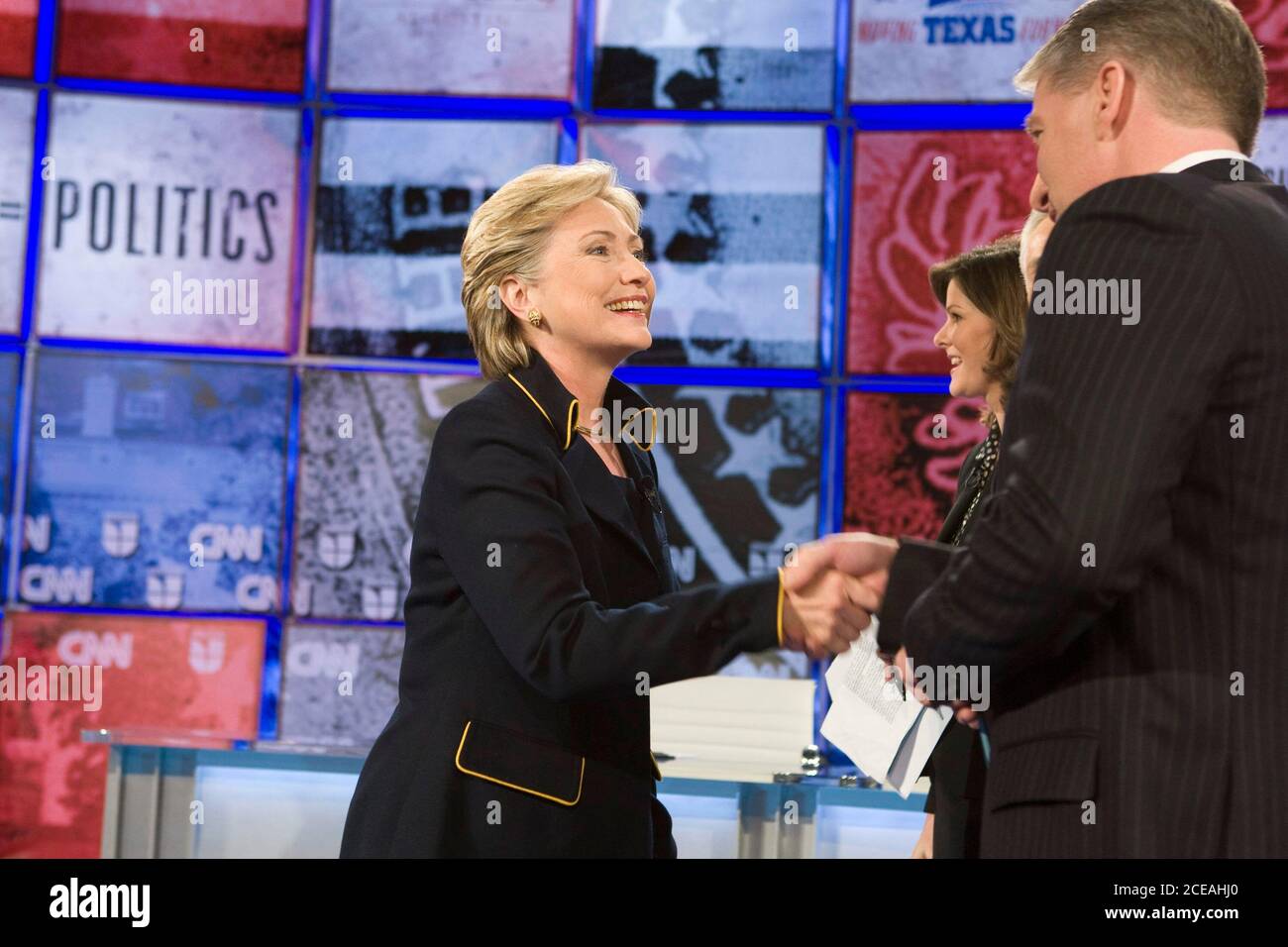 Austin, Texas February 21, 2008: Senator Hillary Clinton (l) shakes hands with CNN anchor John King on the stage at the University of Texas prior to her debate with Sen. Barack Obama as they vie for the for the Democratic nomination for President of the United States. ©Bob Daemmrich Stock Photo