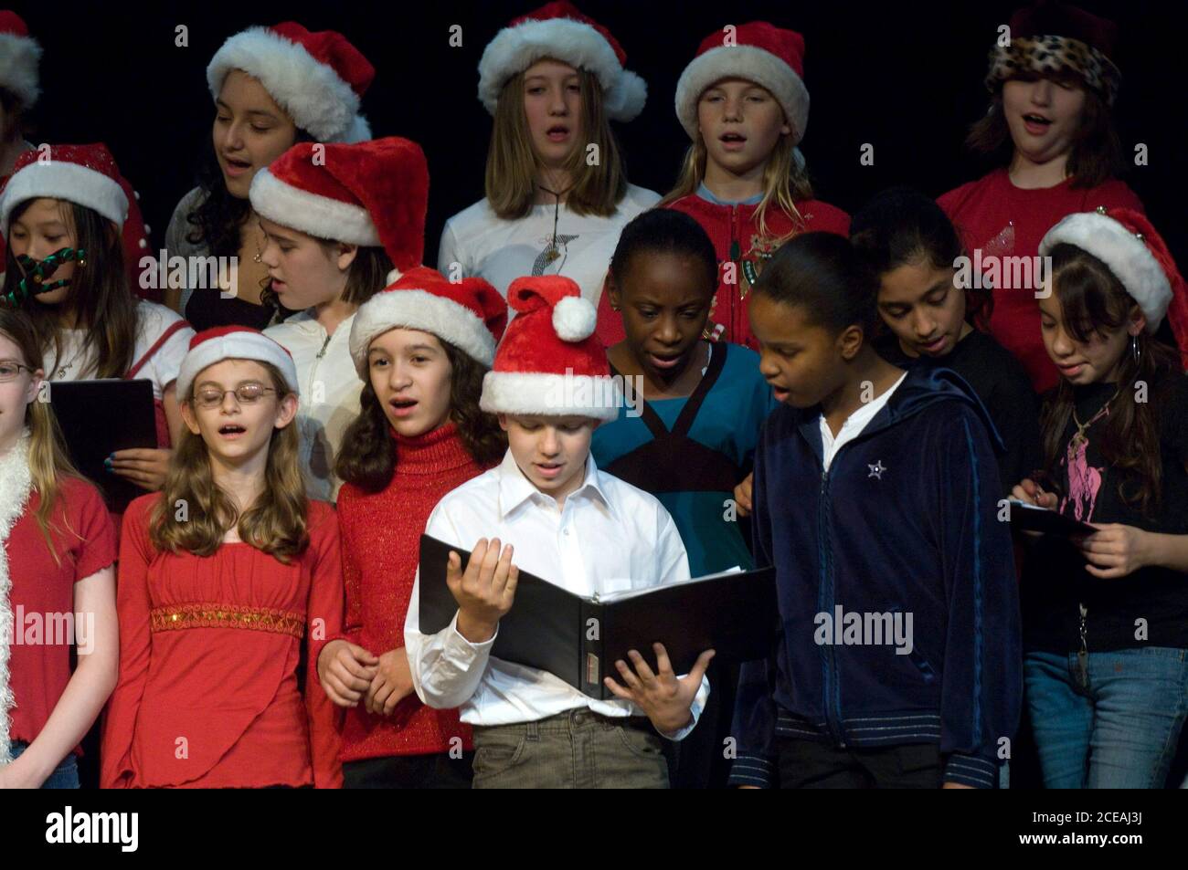 Austin, Texas USA, December 15, 2007: Seventh and eighth grade Christmas choir concert at Kealing Junior High featuring holiday favorites for parents, teachers and students.  ©Bob Daemmrich Stock Photo