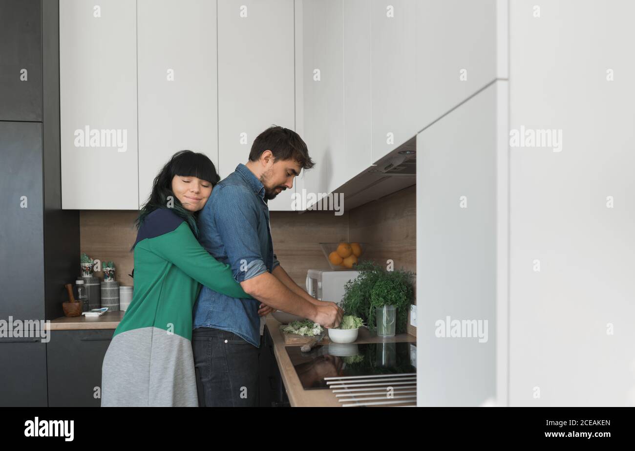 Excited couple in modern kitchen hi-res stock photography and images ...
