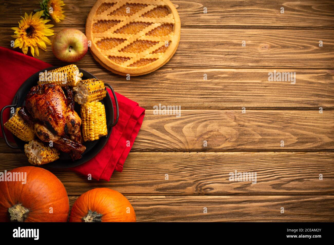 Thanksgiving festive table composition with roasted turkey, pumpkin pie ...