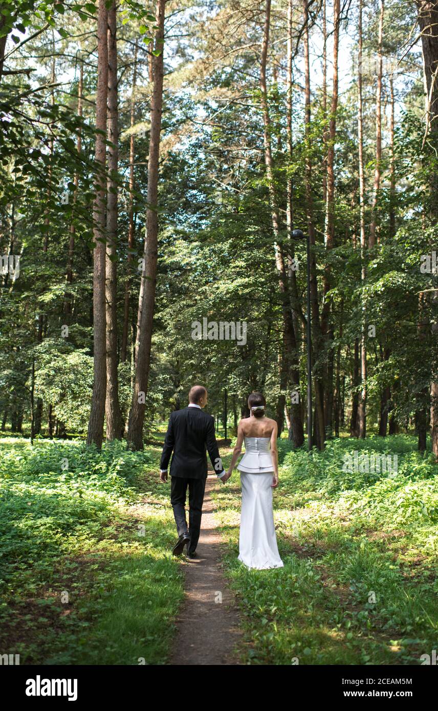 Back view pretty couple holding hi-res stock photography and images - Alamy