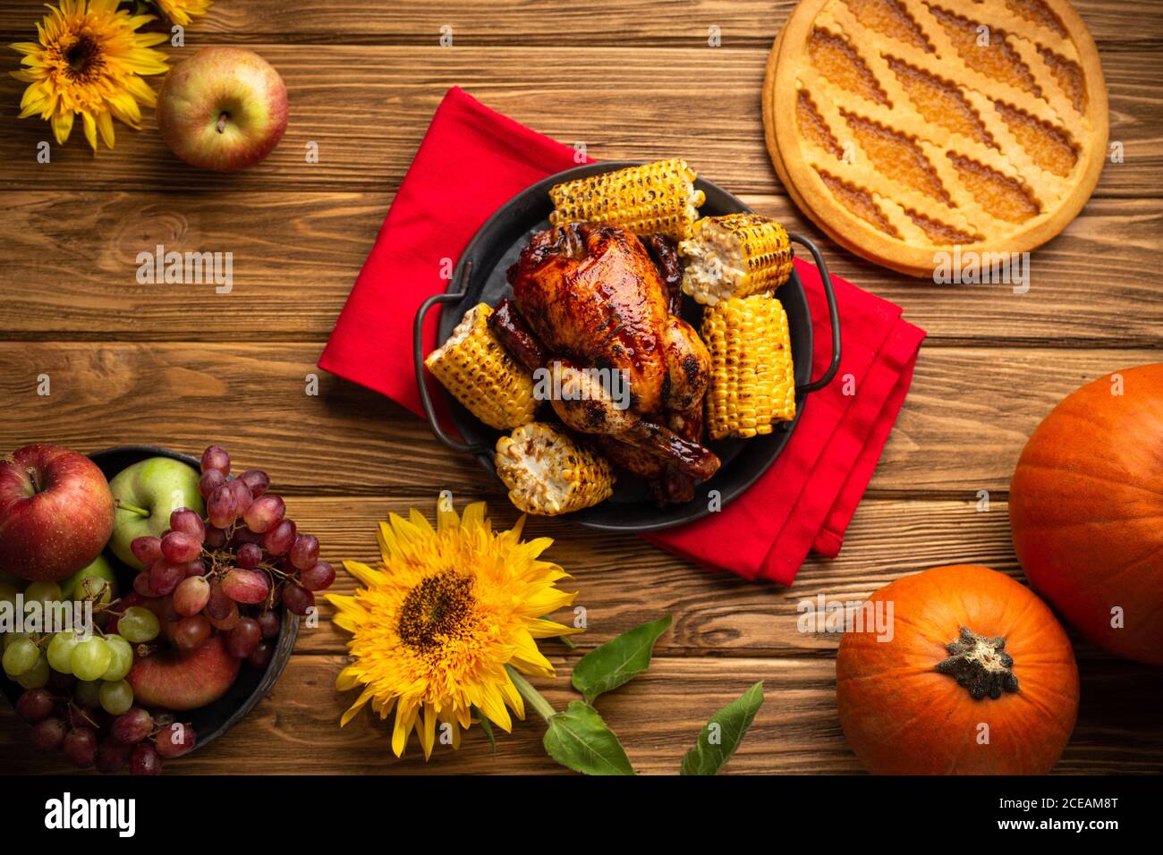 Thanksgiving festive table composition with roasted turkey, pumpkin pie ...