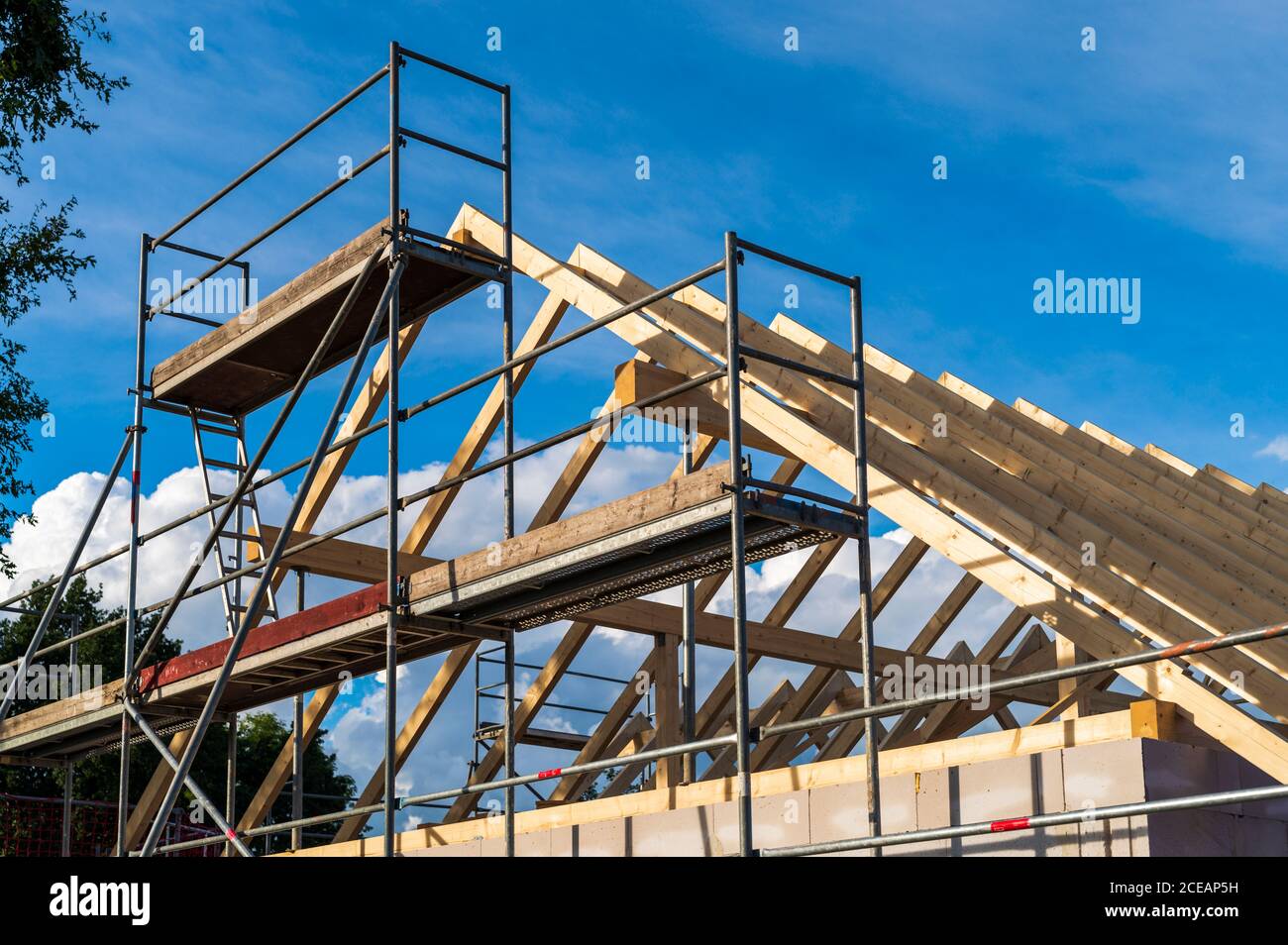 Roof truss of a home with scaffolding Stock Photo