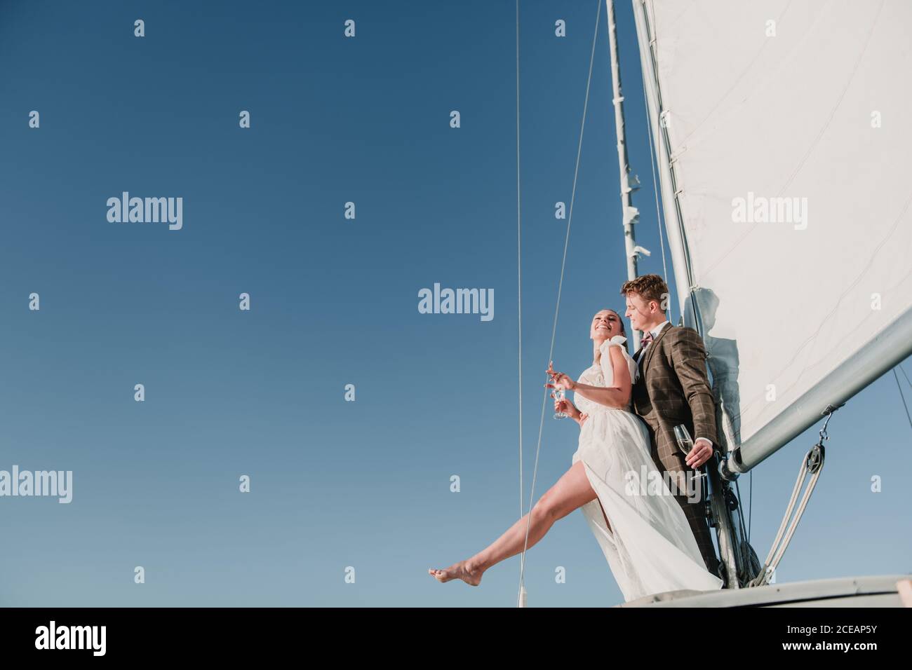 wedding couple having fun in a yacht Stock Photo