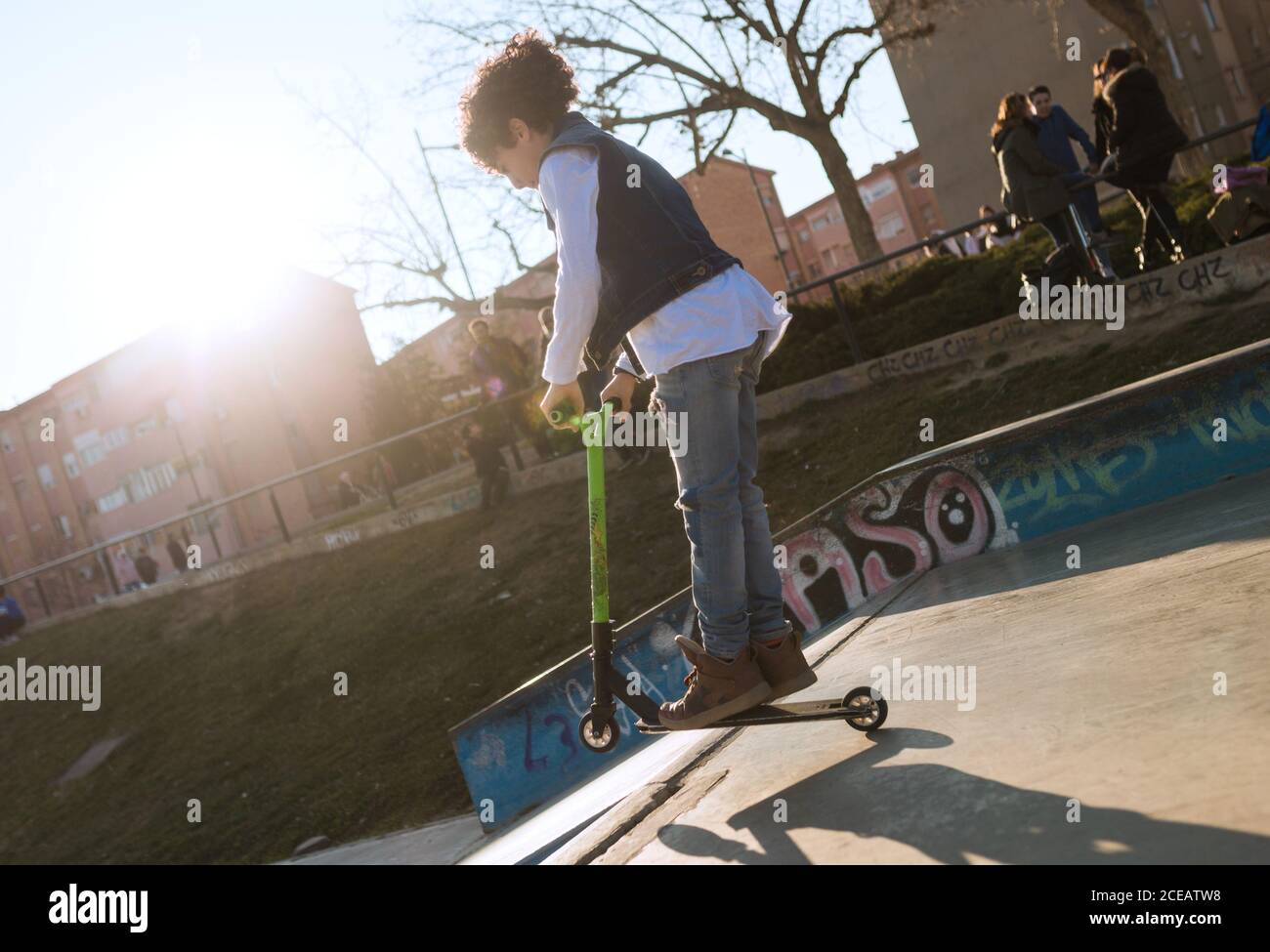 Kids Using Scooters Kids with scooters hi-res stock photography and images - Alamy